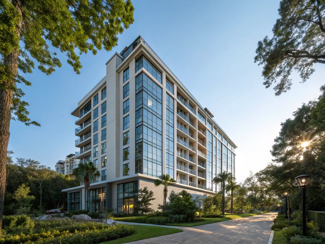 An exterior shot of a modern, luxury residential complex with landscaped gardens and high-end finishes, showcasing architectural design and quality craftsmanship.